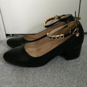 Elegant Black Women's Shoes with Gold Accents